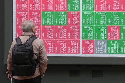 Asian shares mixed after Wall Street gets a lift from hopes for a Fed rate cut