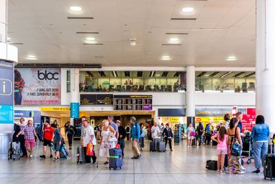 Man stole bags from breastfeeding mother at Gatwick Airport before using head to break barrier
