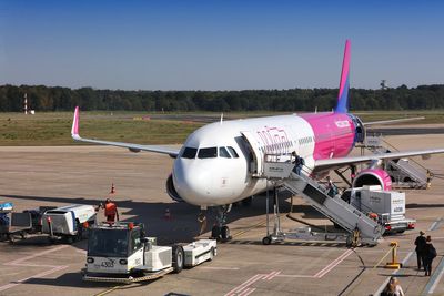 Passengers arrested after storming runway to catch Wizz Air flight