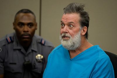 Man charged with killing three people at Planned Parenthood dies in police custody