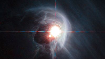 Two stars spiraling toward catastrophe are putting Einstein's gravity to the test