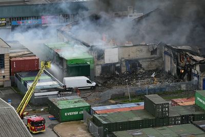 London warehouse still alight after fire tore through building