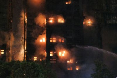 Video: Deadly fire engulfs Hong Kong high-rise apartment blocks