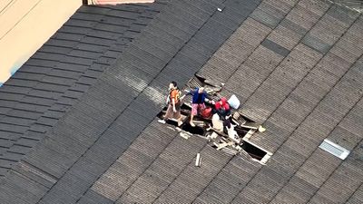 Family of five rescued from roof amid severe flooding in Hat Yai, Thailand