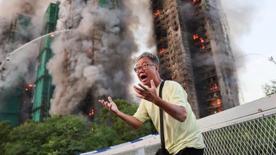 Death toll in Hong Kong tower block fire rises to 44 with hundreds still missing