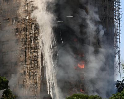 Bamboo scaffolding may be to blame for spread of Hong Kong tower block fire