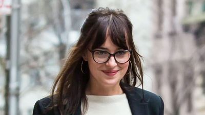 Dakota Johnson demonstrates how jeans and a blazer is the outfit formula that won't go out of fashion, even her boots are still trending