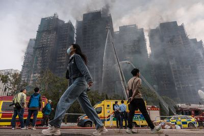 Hong Kong fire latest: Death toll hits 55 with nearly 300 missing as police make arrests