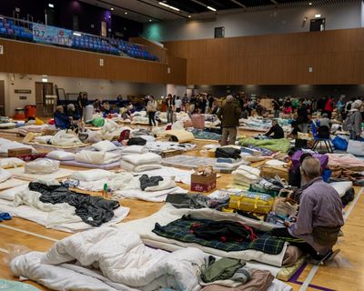 In air thick with acrid smoke, people in Hong Kong are reeling and angry