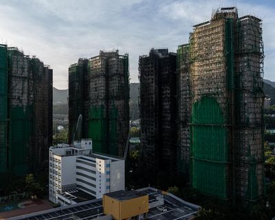 Rescue efforts end at Hong Kong tower block fire as death toll reaches 128