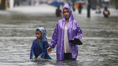 At least 90 dead as floods and landslides hit Indonesia’s Sumatra island