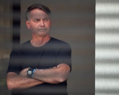 ‘Foam that’s washed away’: support dissolves as Bolsonaro starts 27-year jail term