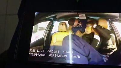 Passenger shifts seats during taxi ride and starts touching the driver, but what he does next while the car is still moving still terrifying