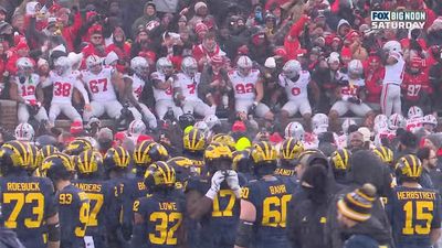 Michigan Players Guard the ‘M’ Logo at Midfield After Ohio State’s Rivalry Win
