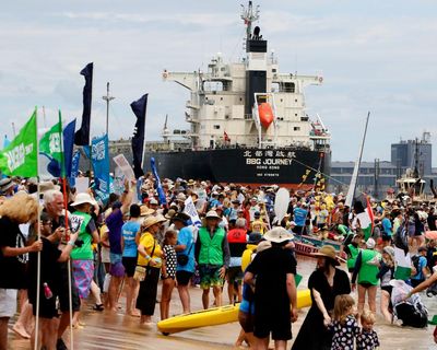 Rising Tide protest: climate activists stop three ships from entering world’s largest coal port in Newcastle