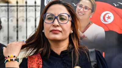 Prominent Tunisian activist arrested as hundreds protest clampdown on dissent