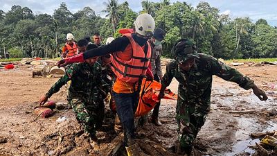 Aerial footage shows destruction left by floods and landslides that killed over 400 in Indonesia