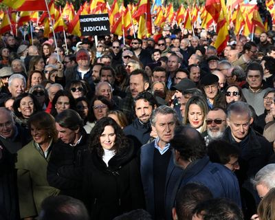 Thousands rally in Madrid to demand snap election over corruption allegations