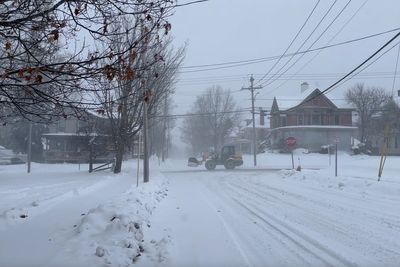 Crews restoring power in Wisconsin while Iowa airport tries to reopen after plane left icy runway