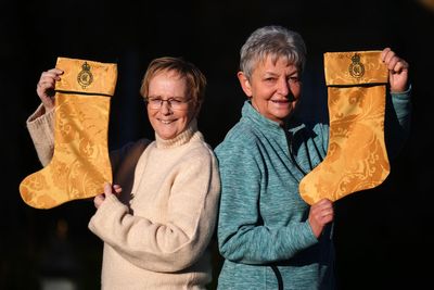 Curtains from King’s country retreat transformed into festive stockings