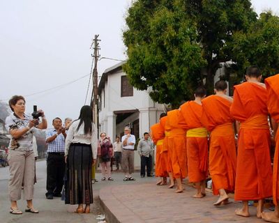 Onlookers review – snapshots of a south-east Asian country shaped by tourism