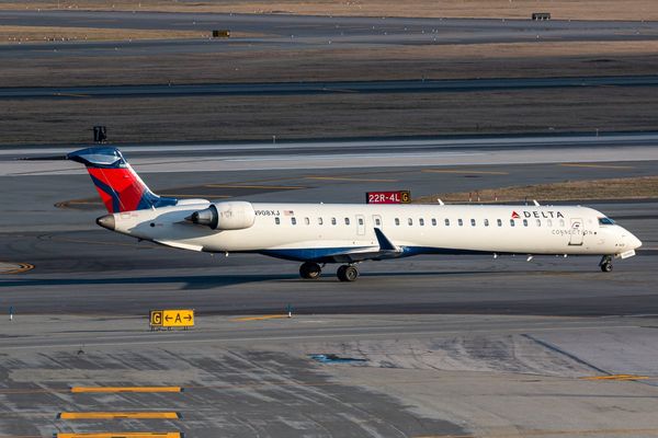 Delta plane slides off icy runway shutting major airport over Thanksgiving weekend