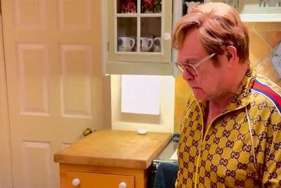 Elton John mocks his own Christmas hit with spoof video