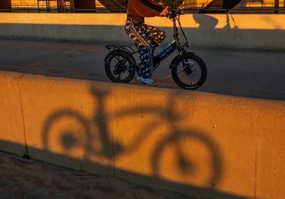 NSW considering plan to halve power and top speed of ebikes as rider dies in collision with garbage truck