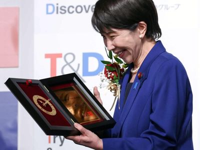 Japan PM’s pledge to ‘work, work, work, work, and work’ wins catchphrase of year