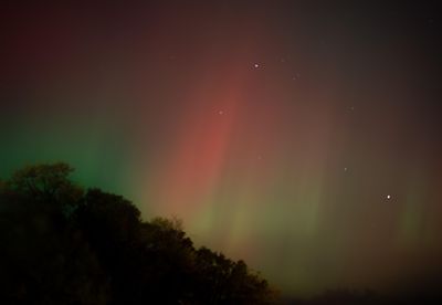 Aurora Colors Mystery: How Ionized Particles and Atmosphere Layers Create Green and Red Auroras