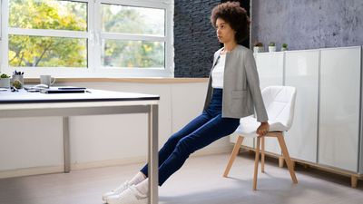 Boost circulation and mobility with this trainer's five-minute desk-side workout