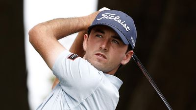 Elvis smiling as young gun shoots to share of Open lead