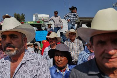 Farmers block Mexico's Congress with tractors in protest against new national water law proposal