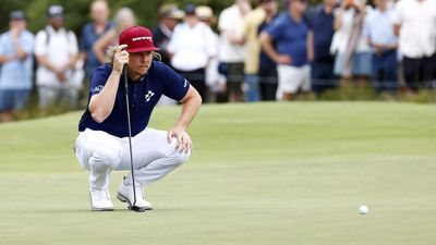 High winds and slick greens all good for Smith