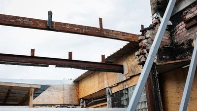 Jews to rebuild stronger a year after temple firebombed