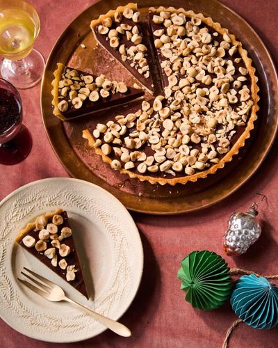 Chocolate tart and zabaglione: Angela Hartnett’s easy make-ahead Christmas desserts – recipes