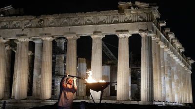 Olympic flame lights up Parthenon before heading to Milan Cortina Winter Games