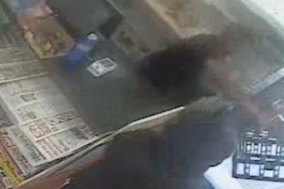 Brave shopkeeper fights off knife-wielding robber with milk crate