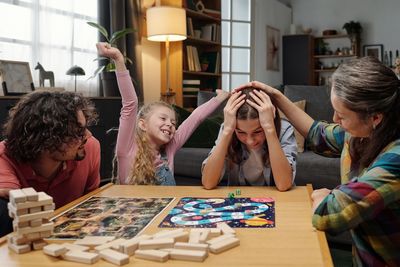 Ways Parents Can Sneak in Money Lessons at Family Game Night