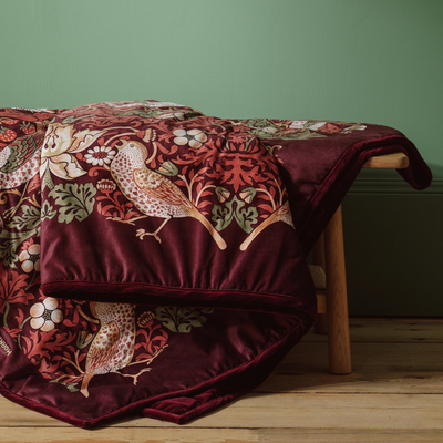 Habitat has quietly dropped new Morris & Co homeware, and I can’t stop lusting after this cosy throw in one of William Morris’ most iconic prints