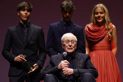 Michael Caine makes rare public appearance with grandchildren as he receives film honour