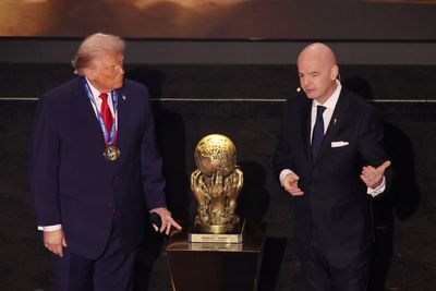 Donald Trump awarded inaugural FIFA peace prize at World Cup draw