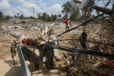 Survivors plead for urgent aid after catastrophic floods and landslides killed over 1,500 in Asia