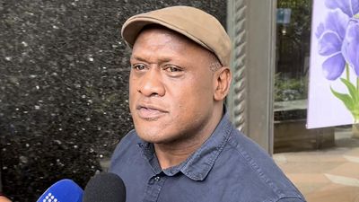 Night in custody for NRL legend over bizarre street act