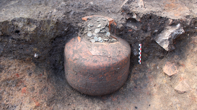 1,800-year-old 'piggy banks' full of Roman-era coins unearthed in French village