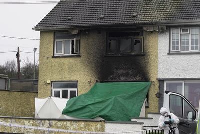 Police launch murder investigation after woman and boy die in blaze