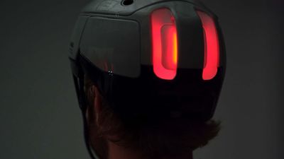 Rivian's e-Bike Offshoot Debuts a Smart Helmet With Headlights and Brake Lights