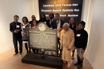 Bullet-pocked marker memorializing 1918 lynching goes on display in Atlanta