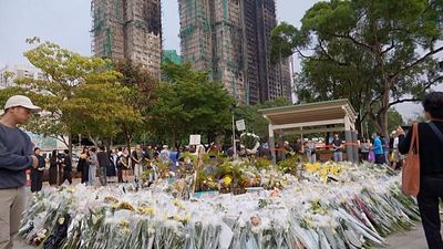 Hundreds mourn Hong Kong's deadliest fire victims ahead of elections