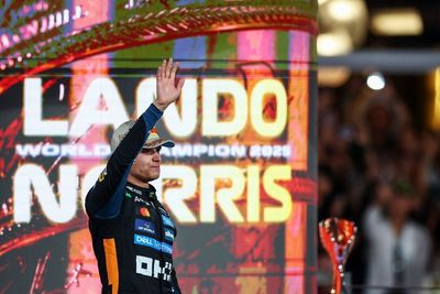 Lando Norris holds back tears during McLaren tribute after claiming drivers' championship